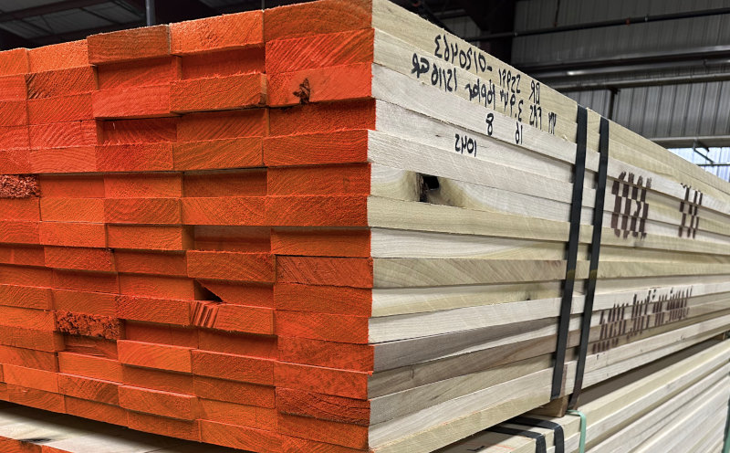 Wide gang ripped lumber that is getting ready for packaging and shipment.